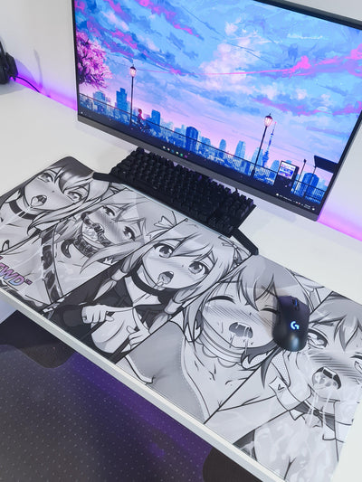 Large black and white mousepad featuring 5 varying styles of ahegao faces